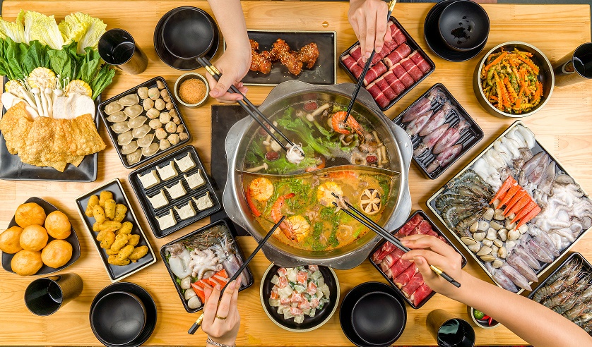 Vietnamese hot pot with seafood, vegetables and meats